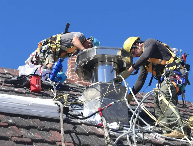 Protective chimney cap installed by Barberton Chimney Sweep in Barberton, OH