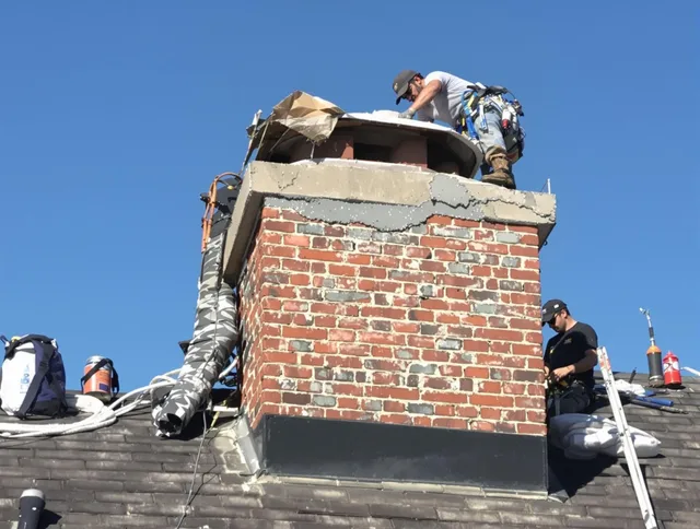 Barberton Chimney Sweep installing a custom chimney crown in Barberton, OH