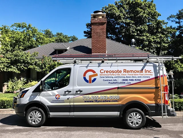 Barberton Chimney Sweep technician removing creosote safely in Barberton, OH